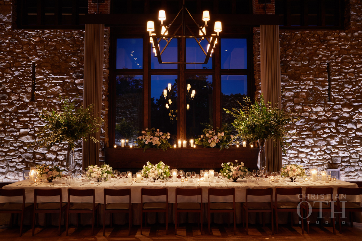 Long table with branches and flowers for Blue Hill at Stone Barns wedding