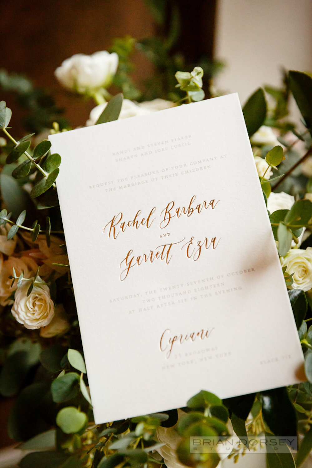 Calligraphy and metallic foil stamped wedding invitation