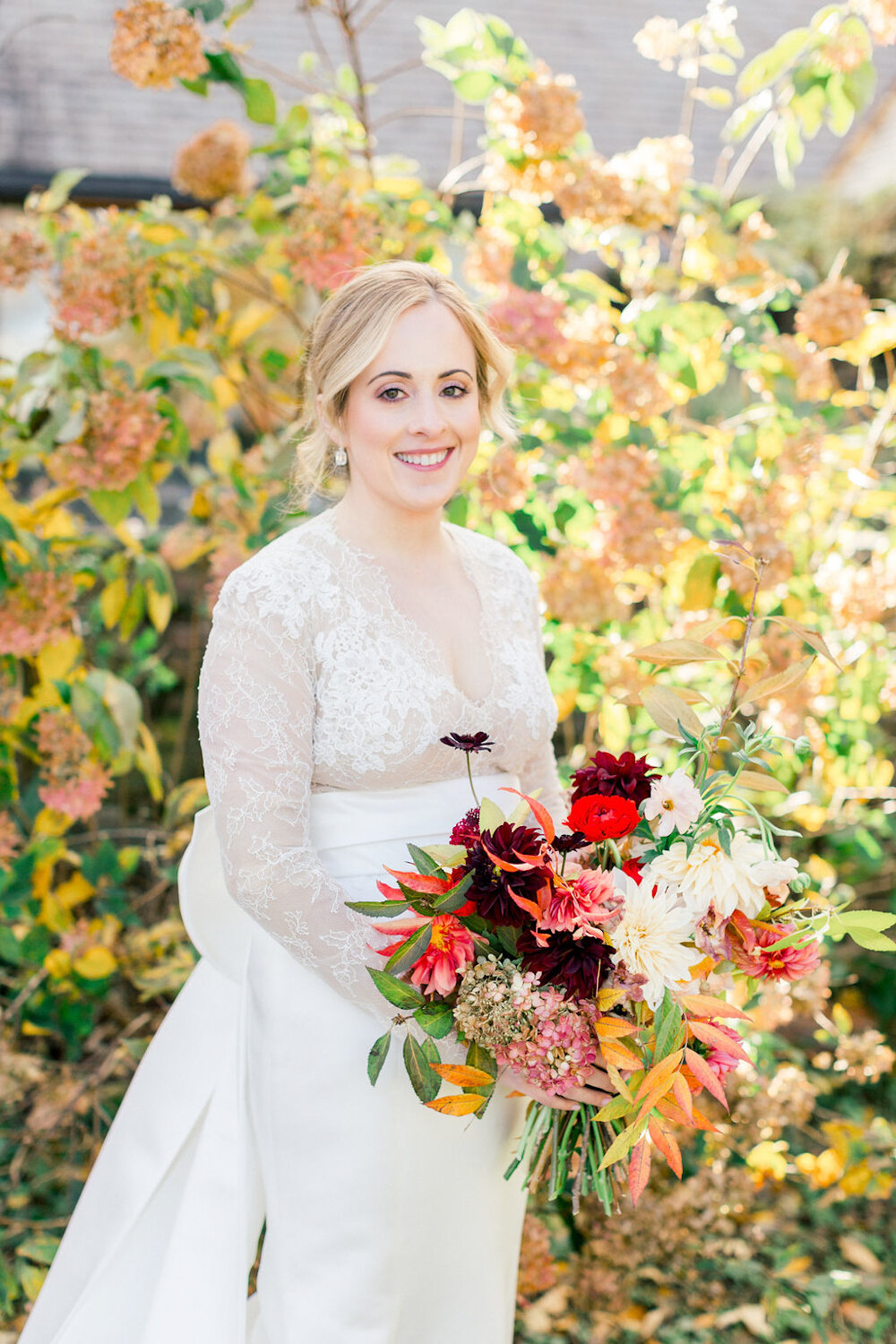 Blue Hill at Stone Barns Wedding bride holding fall bouquet