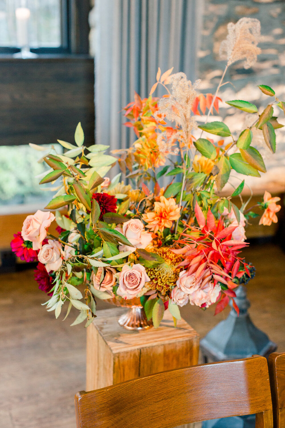 Blue Hill at Stone Barns wedding ceremony fall flowers