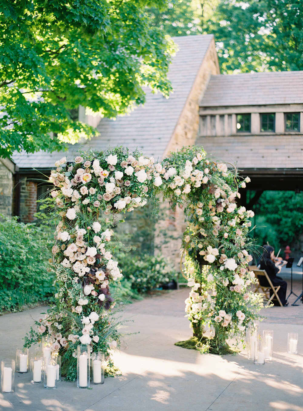 Blue Hill at Stone Barns wedding ceremony floral arch