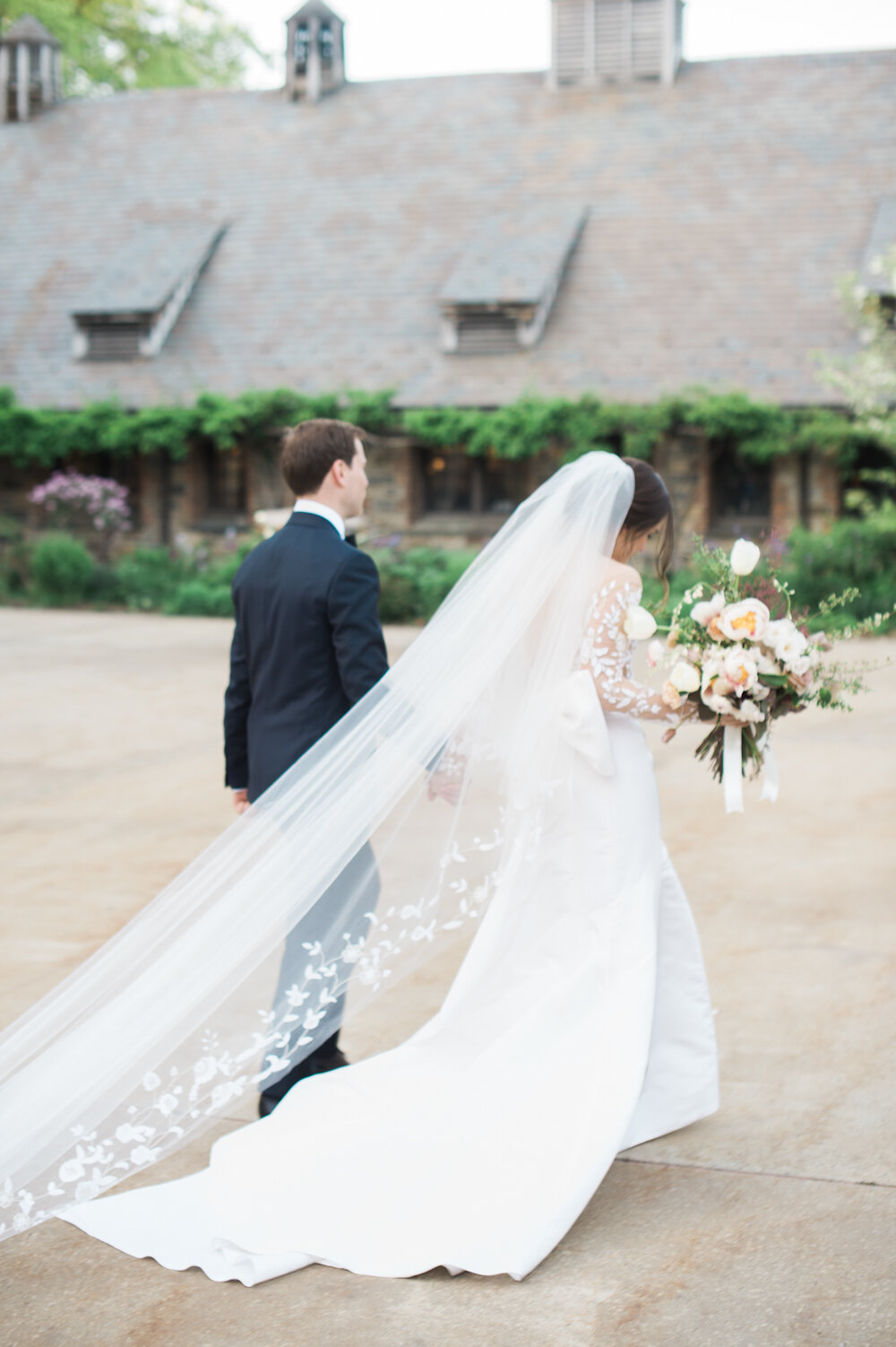 Blue Hill at Stone Barns wedding ceremony bride wearing long veil oscar de la renta