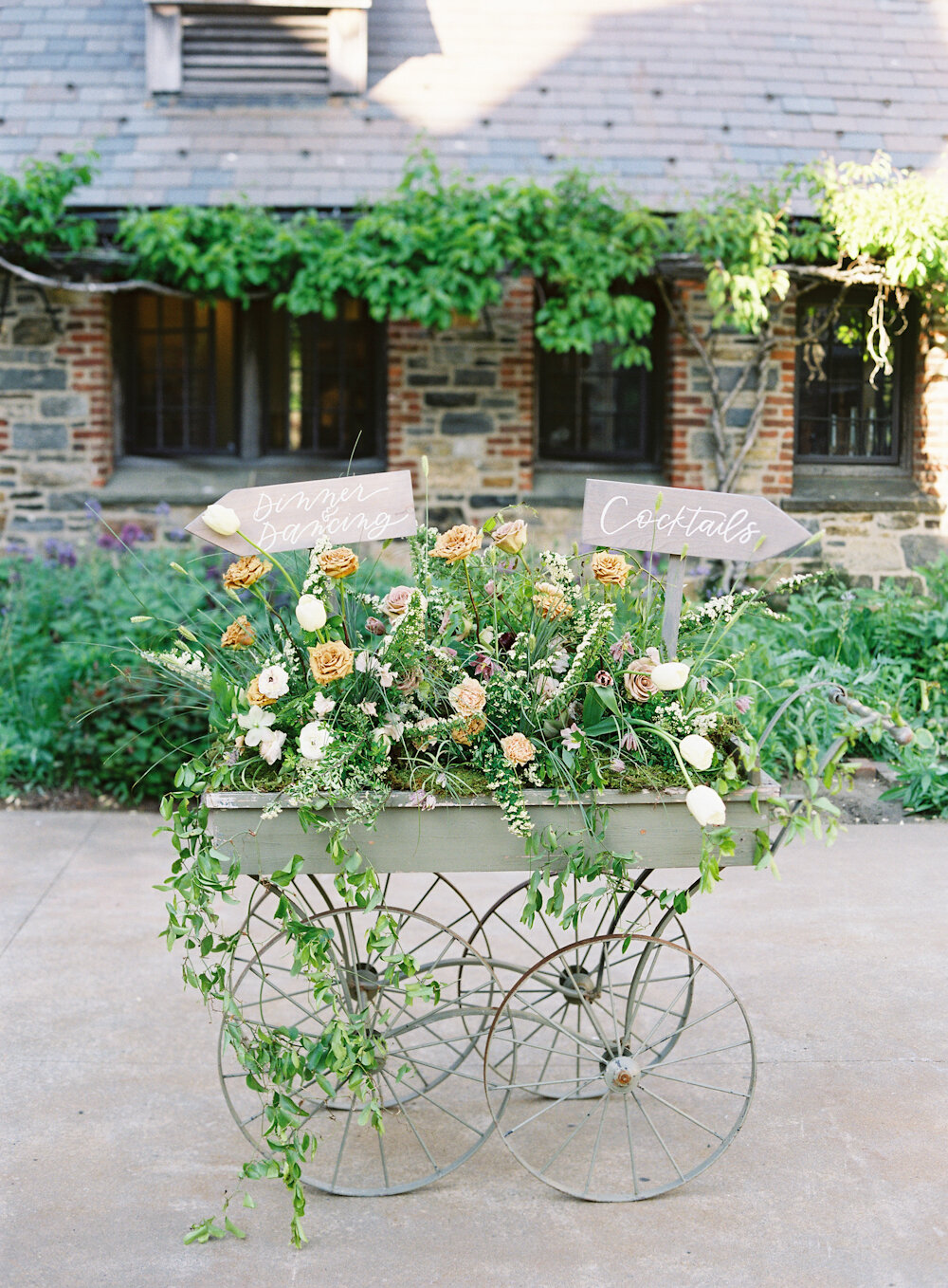 Blue Hill at Stone Barns wedding flower cart with signage