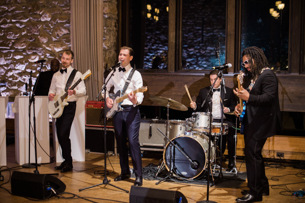 Blue Hill at Stone Barns wedding groom playing a song