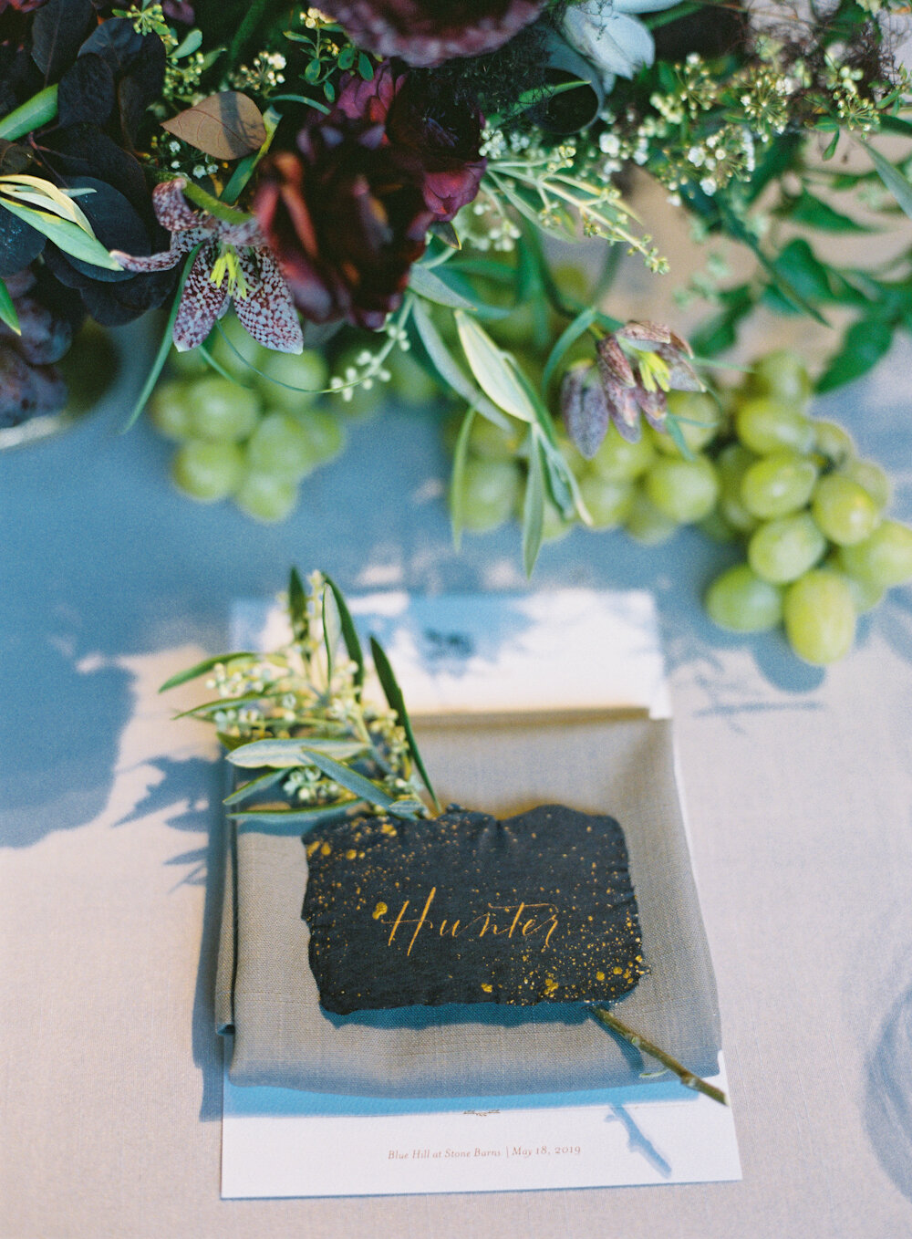 Blue Hill at Stone Barns wedding place card with hand calligraphy and hand torn edges