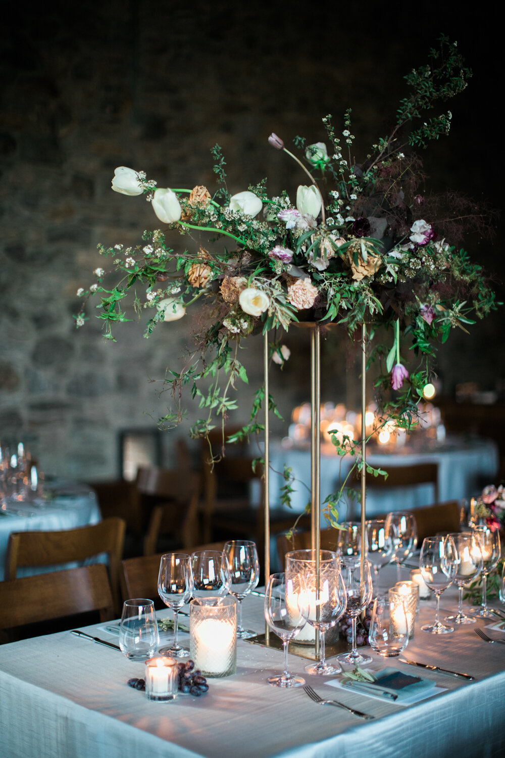 Blue Hill at Stone Barns wedding tall centerpiece in the hayloft