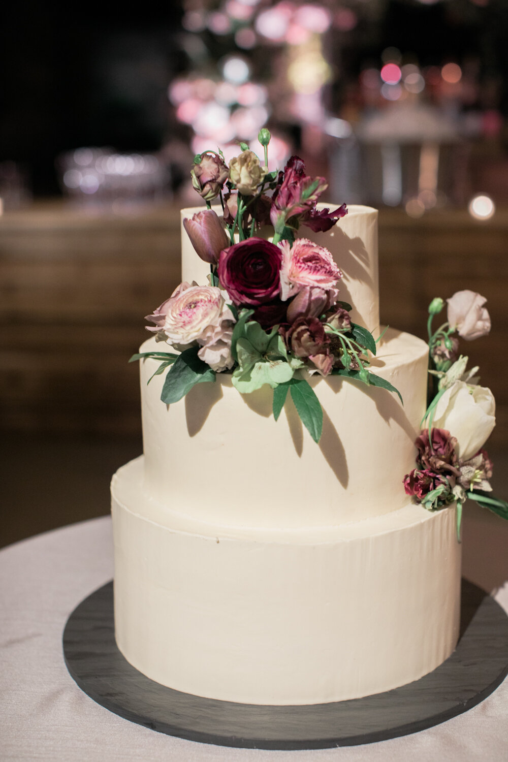 Blue Hill at Stone Barns wedding cake in buttercream with fresh flowers