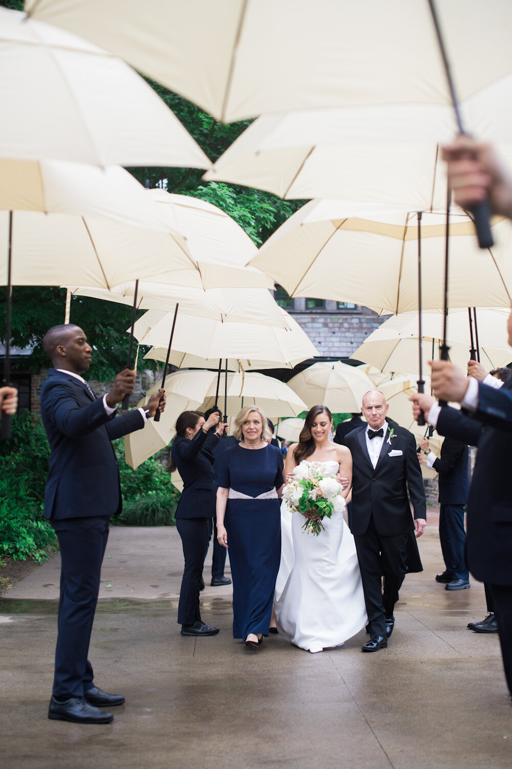 Blue Hill at Stone Barns jewish wedding bride enters under umbrellas