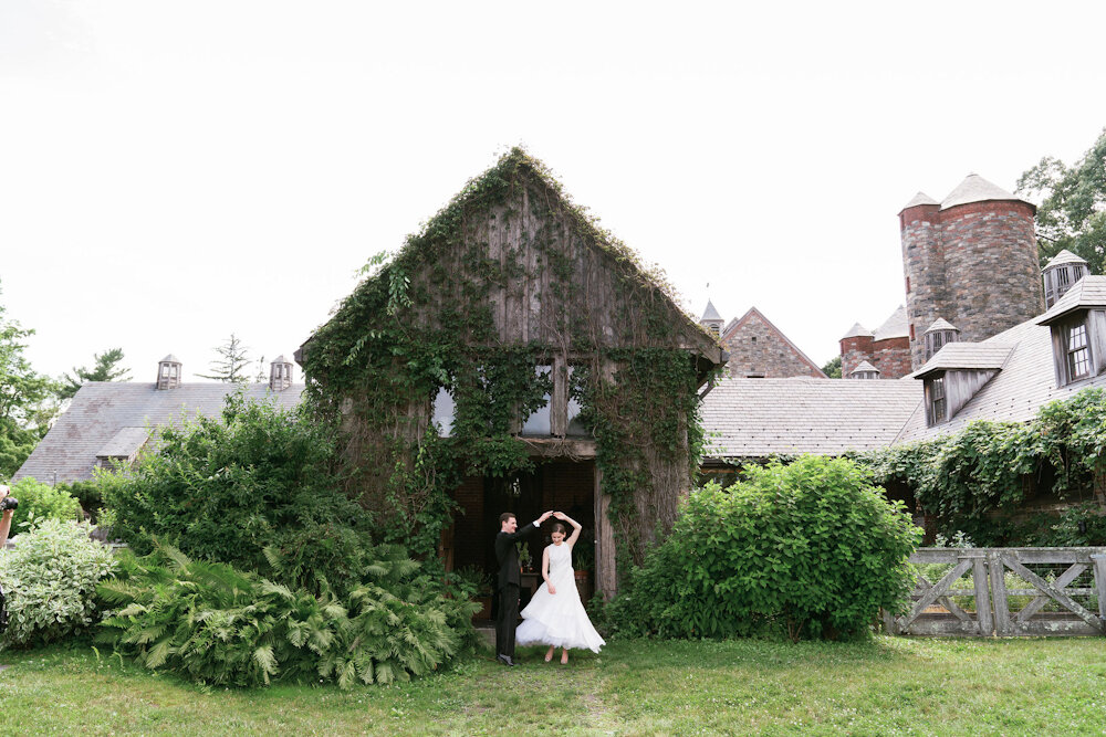 Blue Hill at Stone Barns wedding bride groom dancing in front of ivy shed