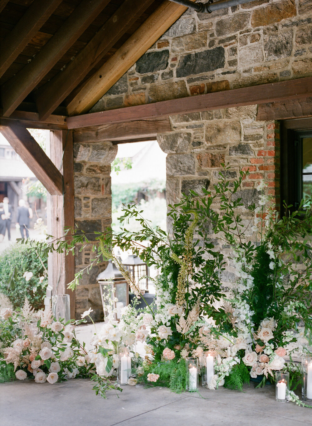 Blue Hill at Stone Barns wedding ceremony flower installation