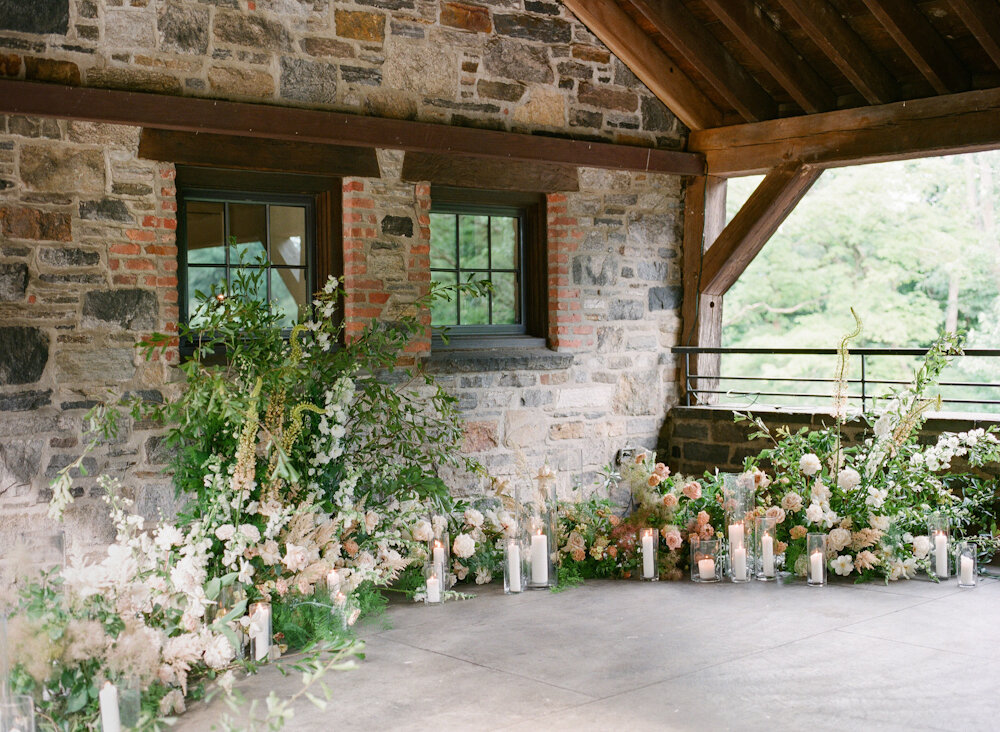 Blue Hill at Stone Barns wedding ceremony flower installation