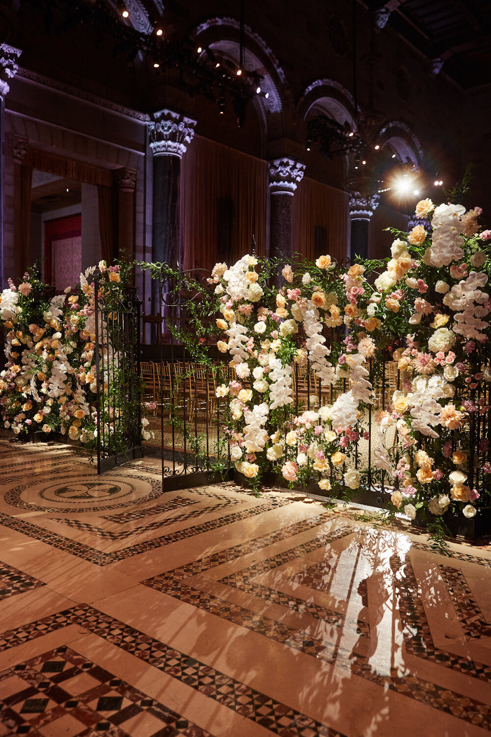 Cipriani 42nd Street wedding flower wall on iron gate