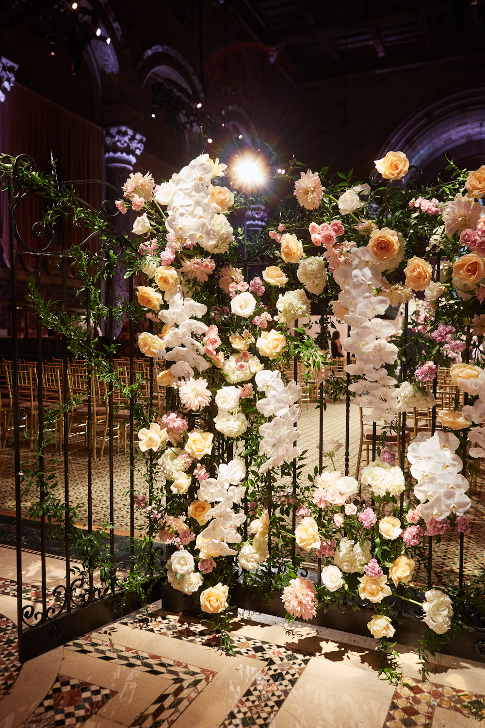 Cipriani 42nd Street wedding flower wall on iron gate