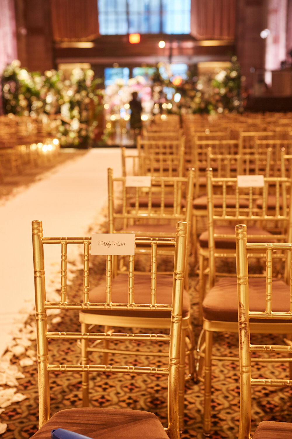 Cipriani 42nd Street wedding place cards on ceremony chairs