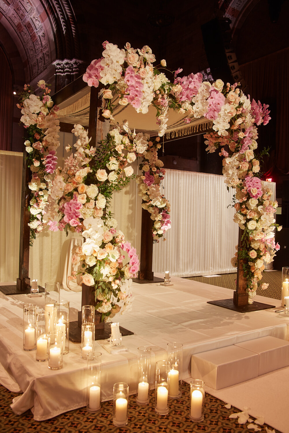 Cipriani 42nd Street wedding chuppah with roses and orchids