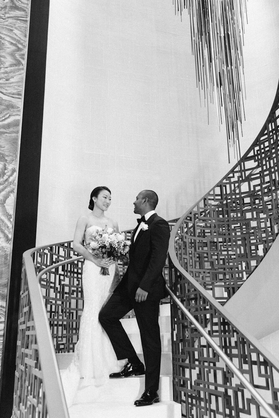 Four Seasons NYC wedding downtown bride and groom at staircase