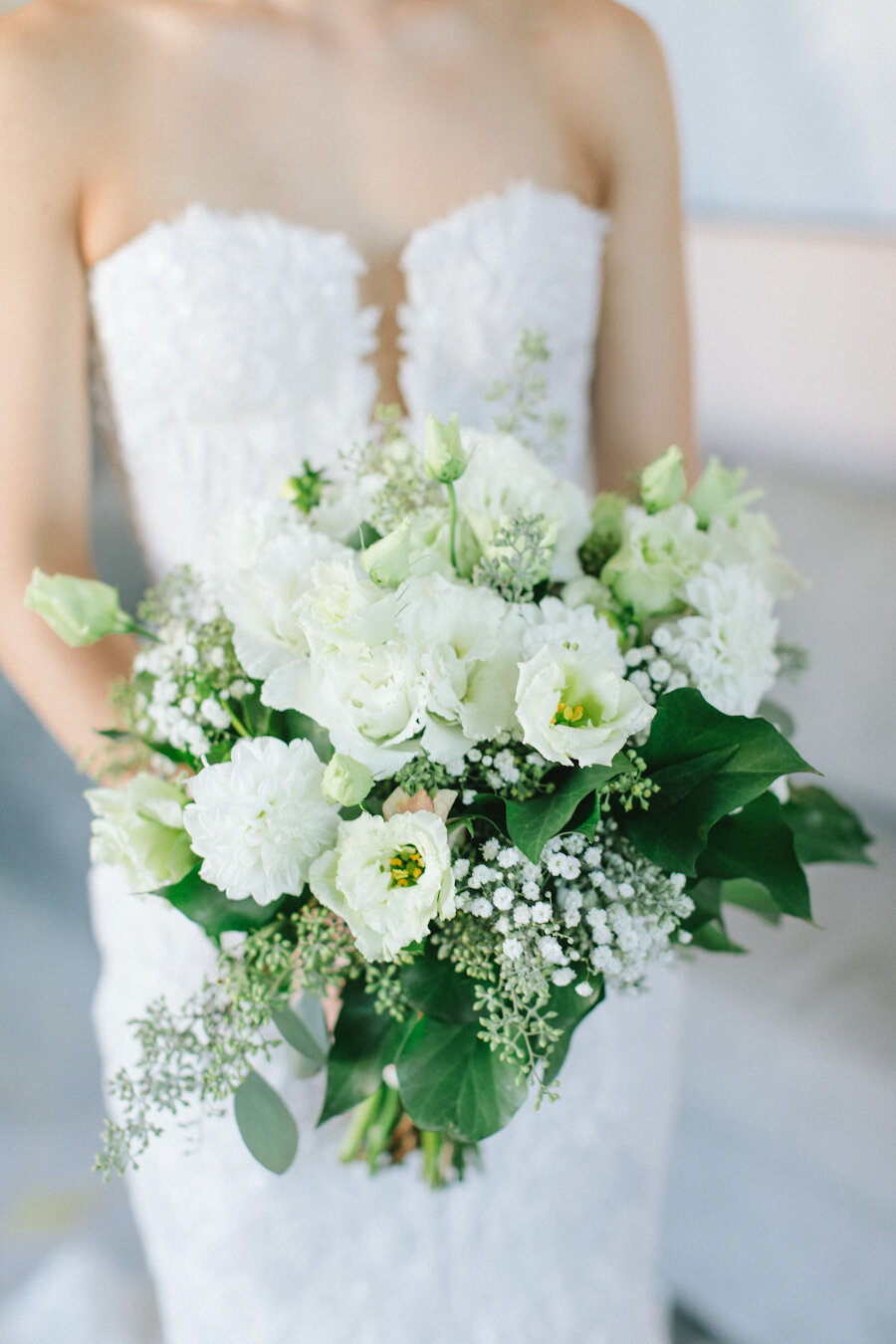 Four Seasons NYC wedding bride holding white bouquet