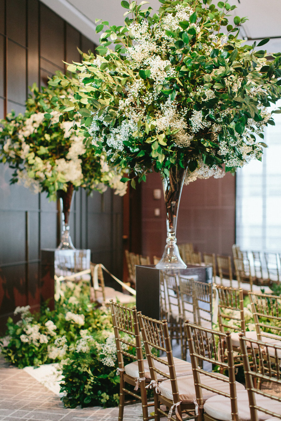 Four Seasons NYC wedding ceremony flowers baby's breath branch tall arrangements
