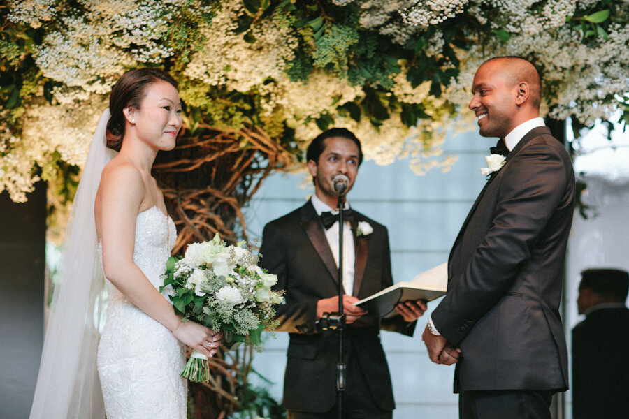 Four Seasons NYC wedding ceremony bride and groom