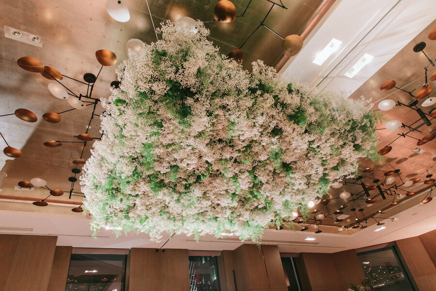 Four Seasons NYC wedding hanging flowers of baby's breath and greenery