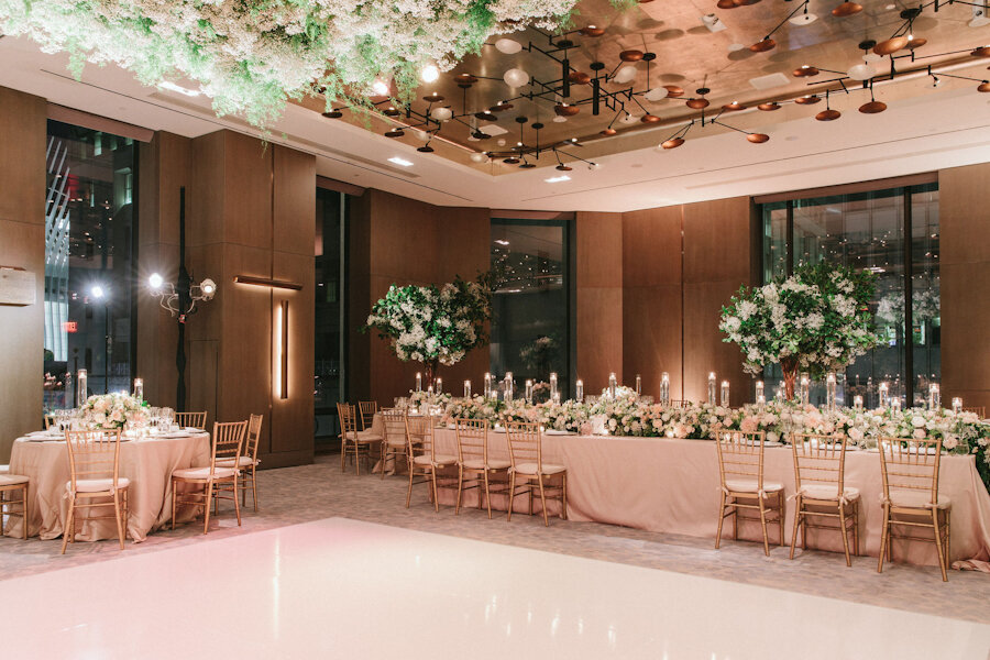 Four Seasons NYC wedding white dance floor and baby's breath flowers
