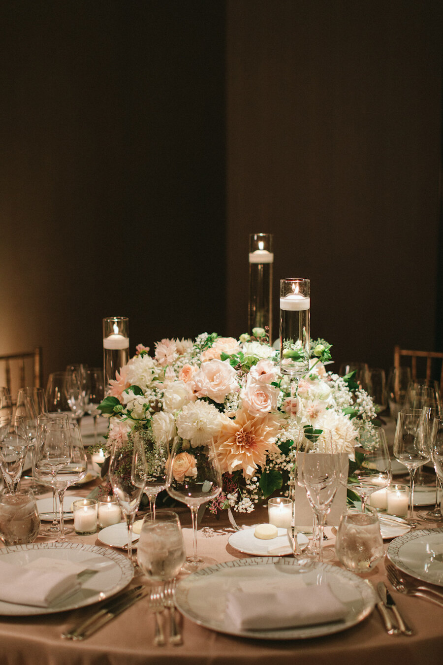Four Seasons NYC wedding low centerpiece with floating candles