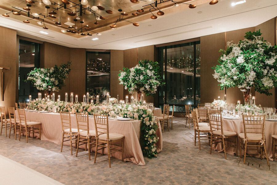 Four Seasons NYC wedding tall branch arrangement with baby's breath