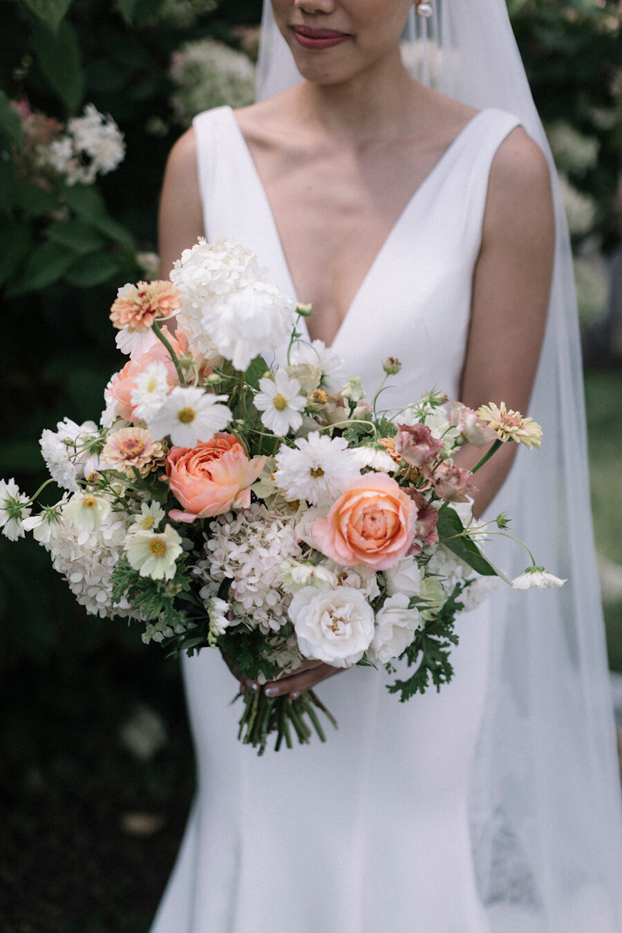 Blue Hill at Stone Barns wedding bouquet in peach and white