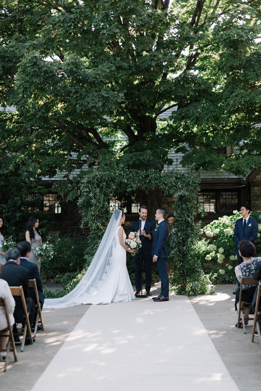 Blue Hill at Stone Barns wedding ceremony in the courtyard