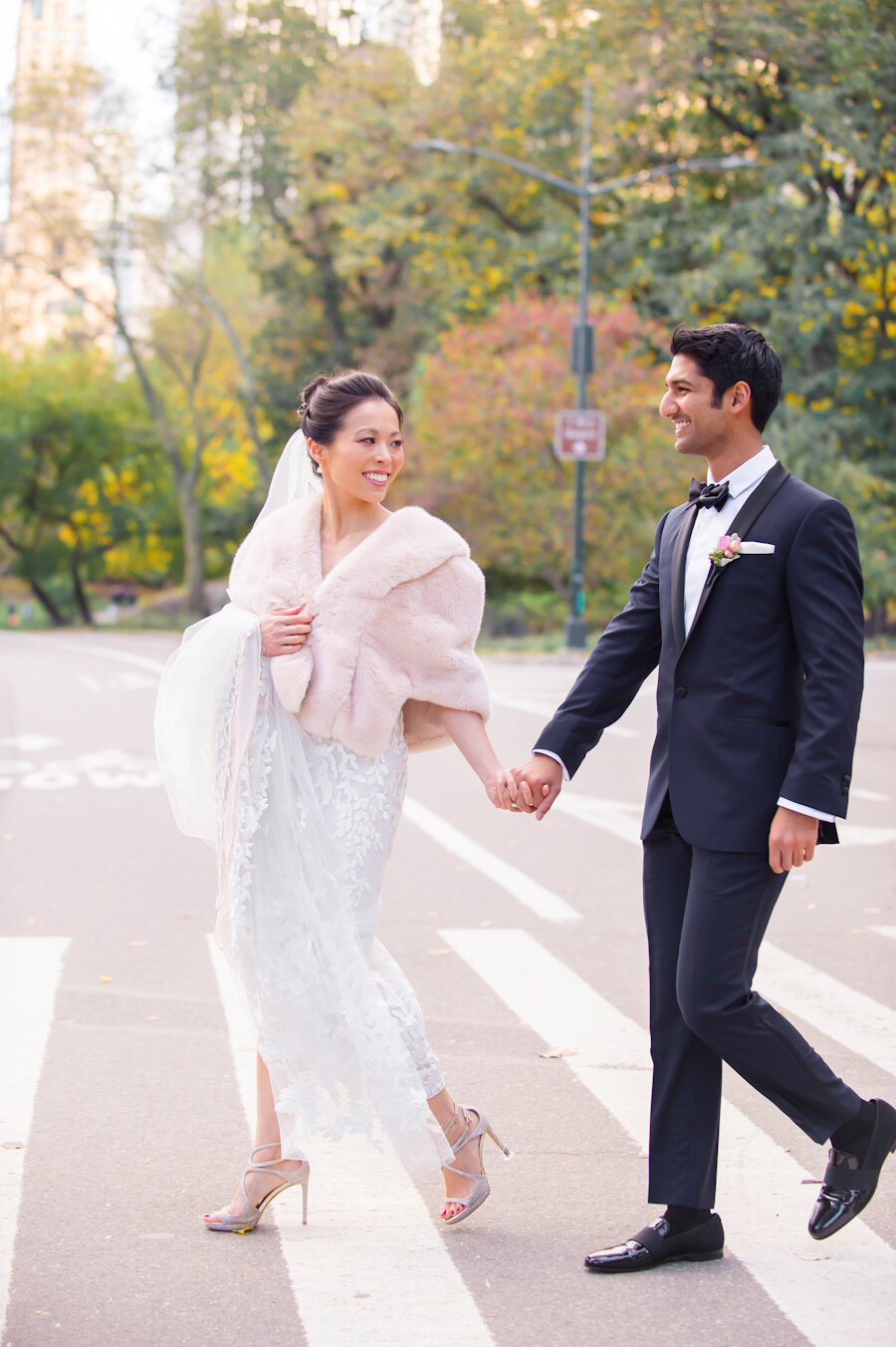 Mandarin Oriental New York wedding bride and groom walk to Central Park
