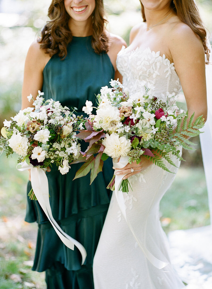 bride and bridesmaids holding bouquets