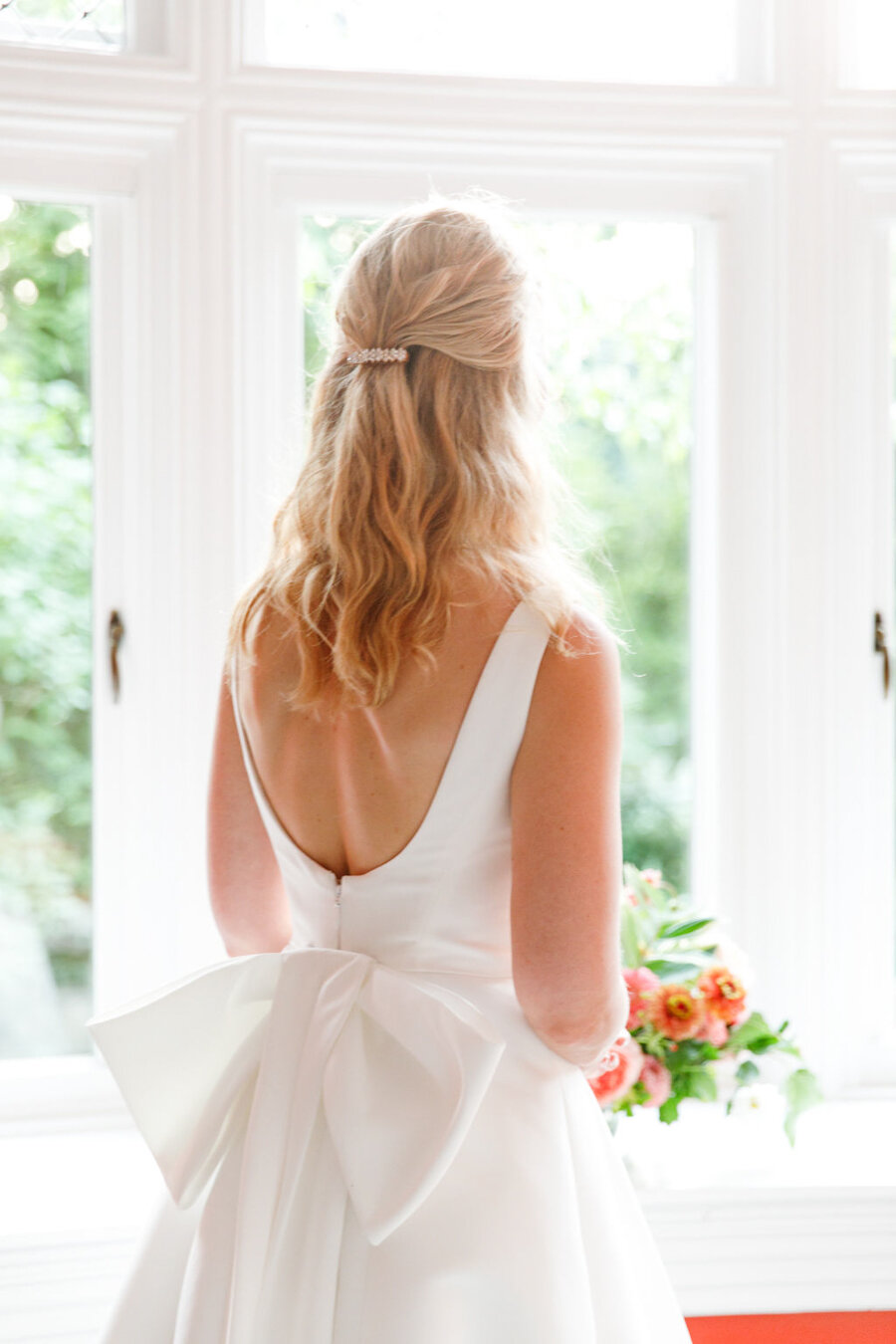 bride with bow on her dress