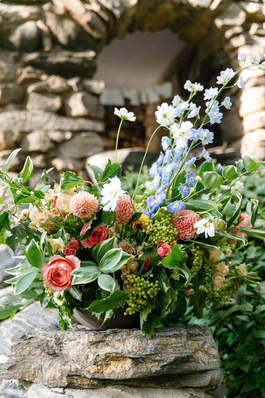 flowers on the stone wall