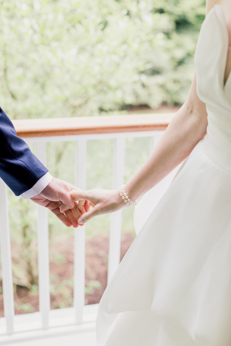 bride-groom-holding-hands.jpg