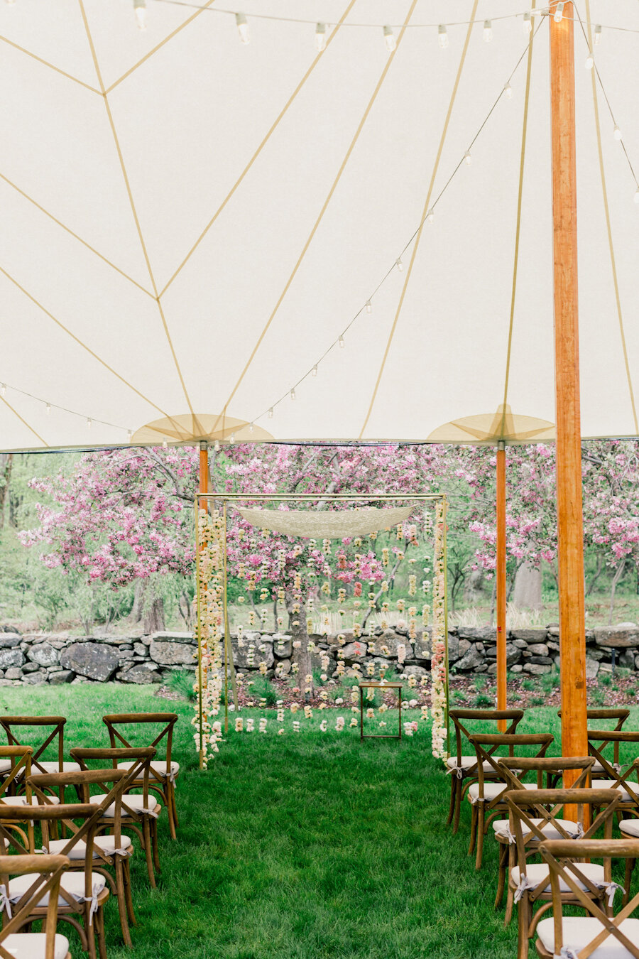 outdoor-wedding-ceremony-chuppah-under-tent.jpg