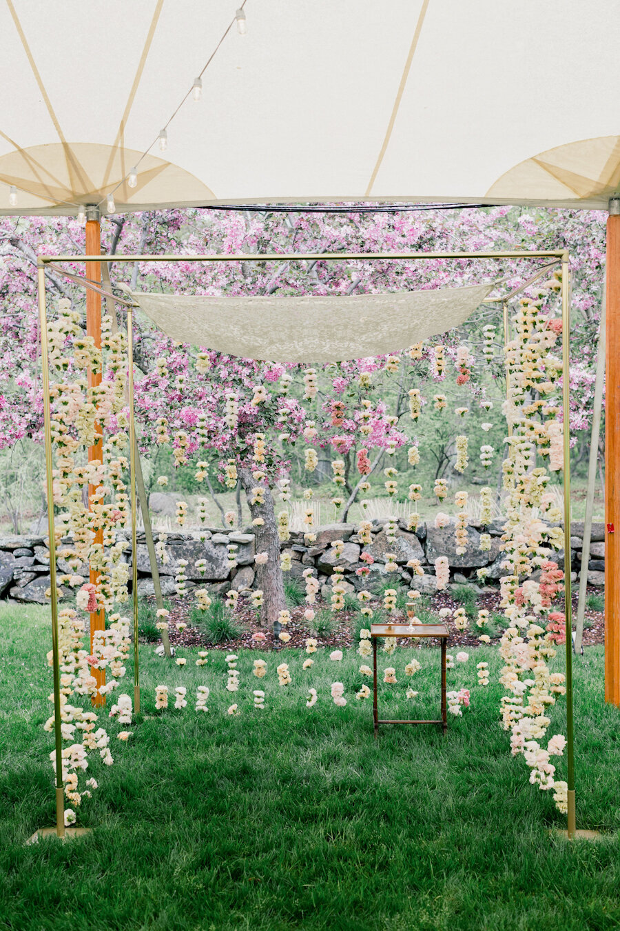 outdoor-wedding-ceremony-chuppah-hanging-flowers.jpg