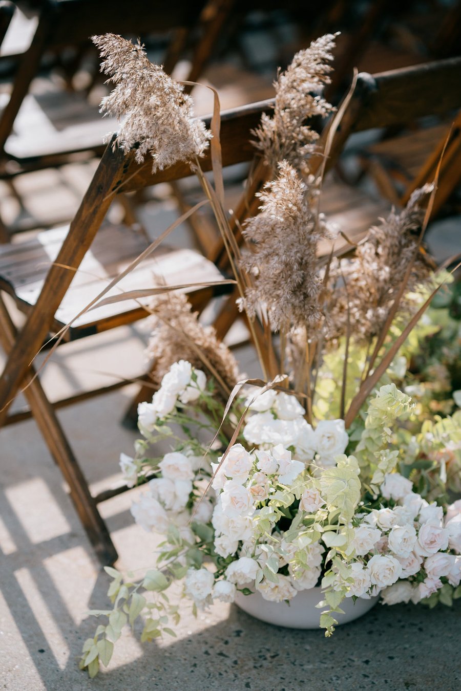 blue-hill-at-stone-barns-wedding-jewish-ceremony-flowers-aisle.jpg