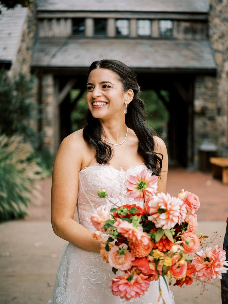 blue-hill-at-stone-barns-wedding-bride-holding-flowers.jpg
