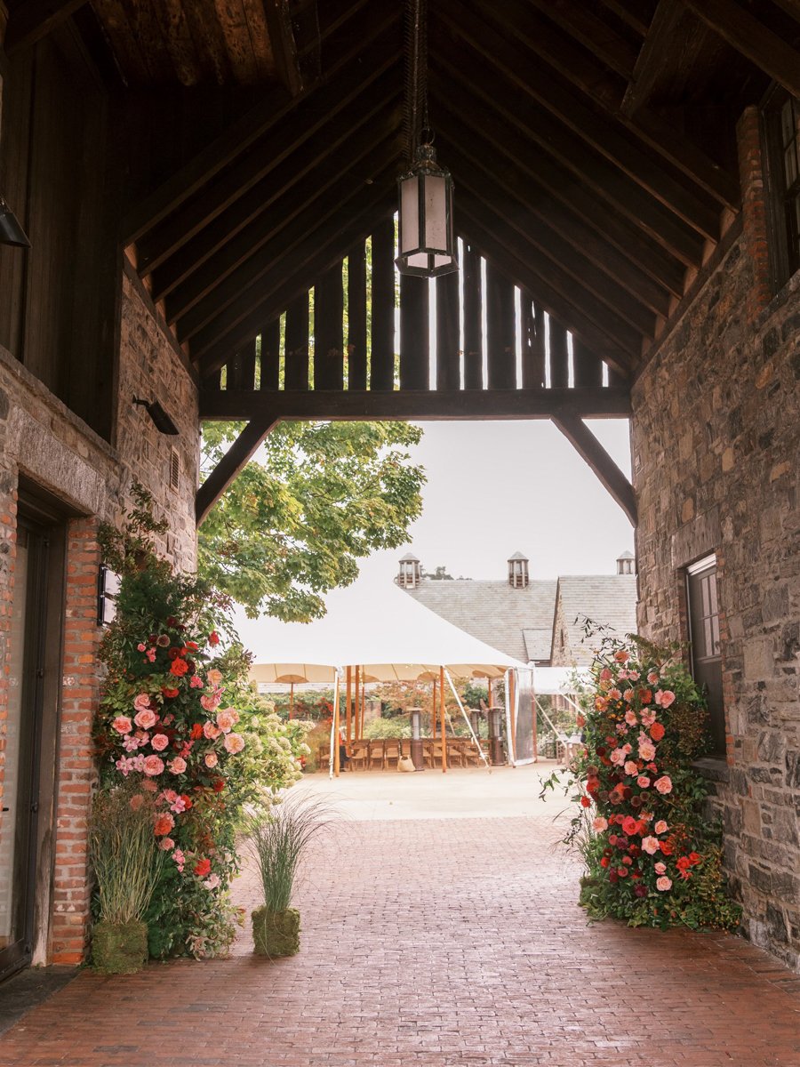blue-hill-at-stone-barns-wedding-ceremony-archway-flower-instsallation.jpg
