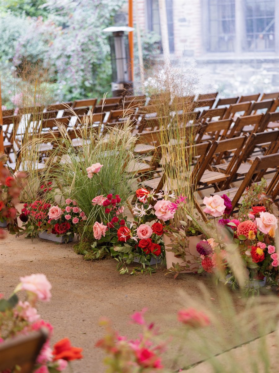 blue-hill-at-stone-barns-wedding-ceremony-aisle-flowers.jpg