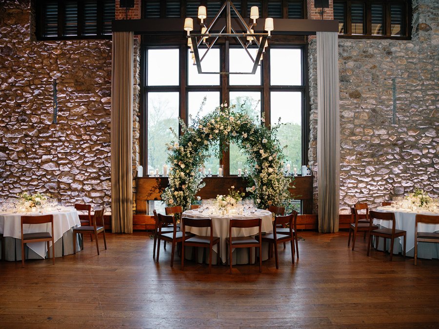 blue-hill-at-stone-barns-wedding-reception-head-table-windows.jpg