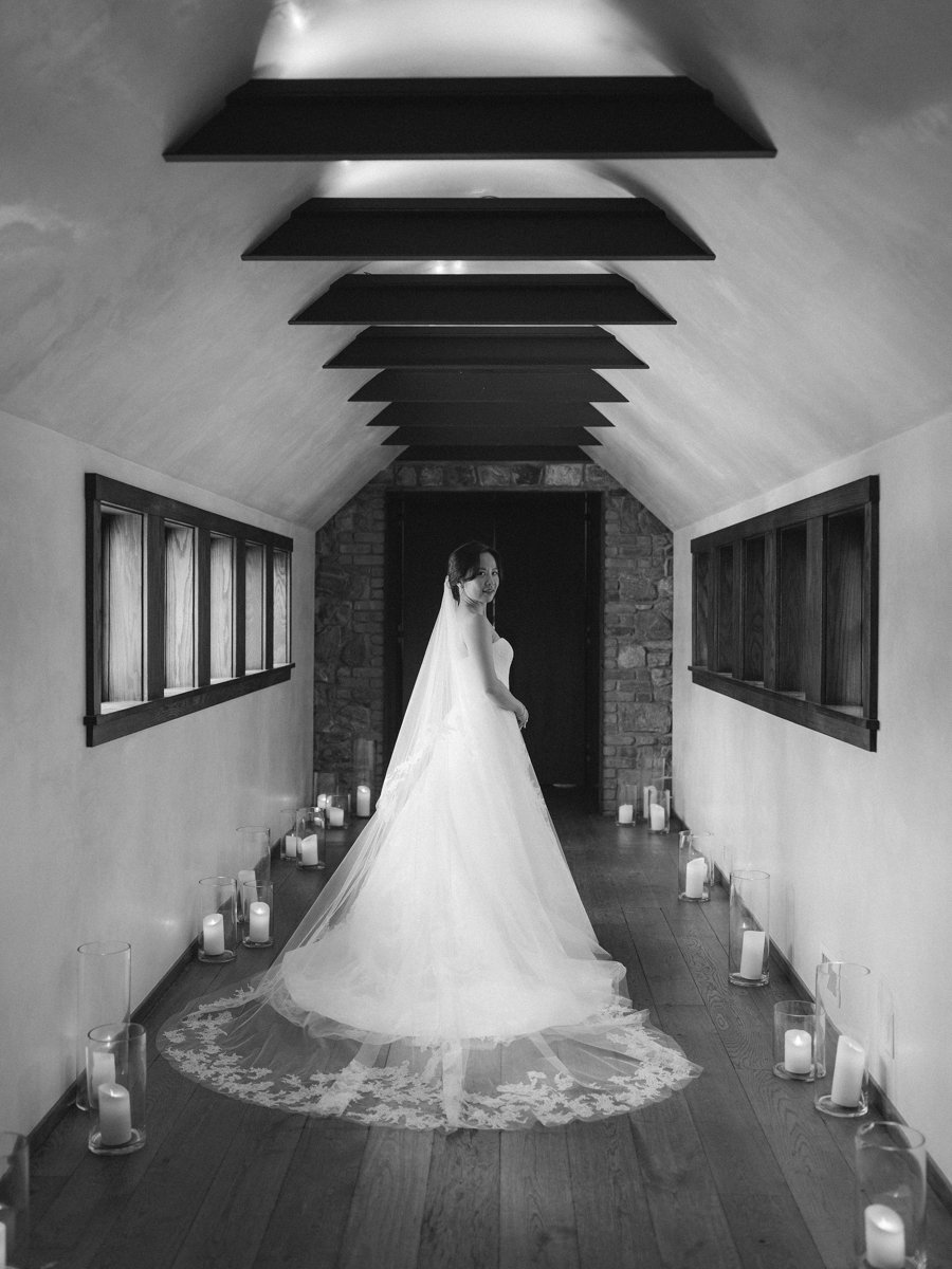 bride-hayloft-hallway-candles.jpg