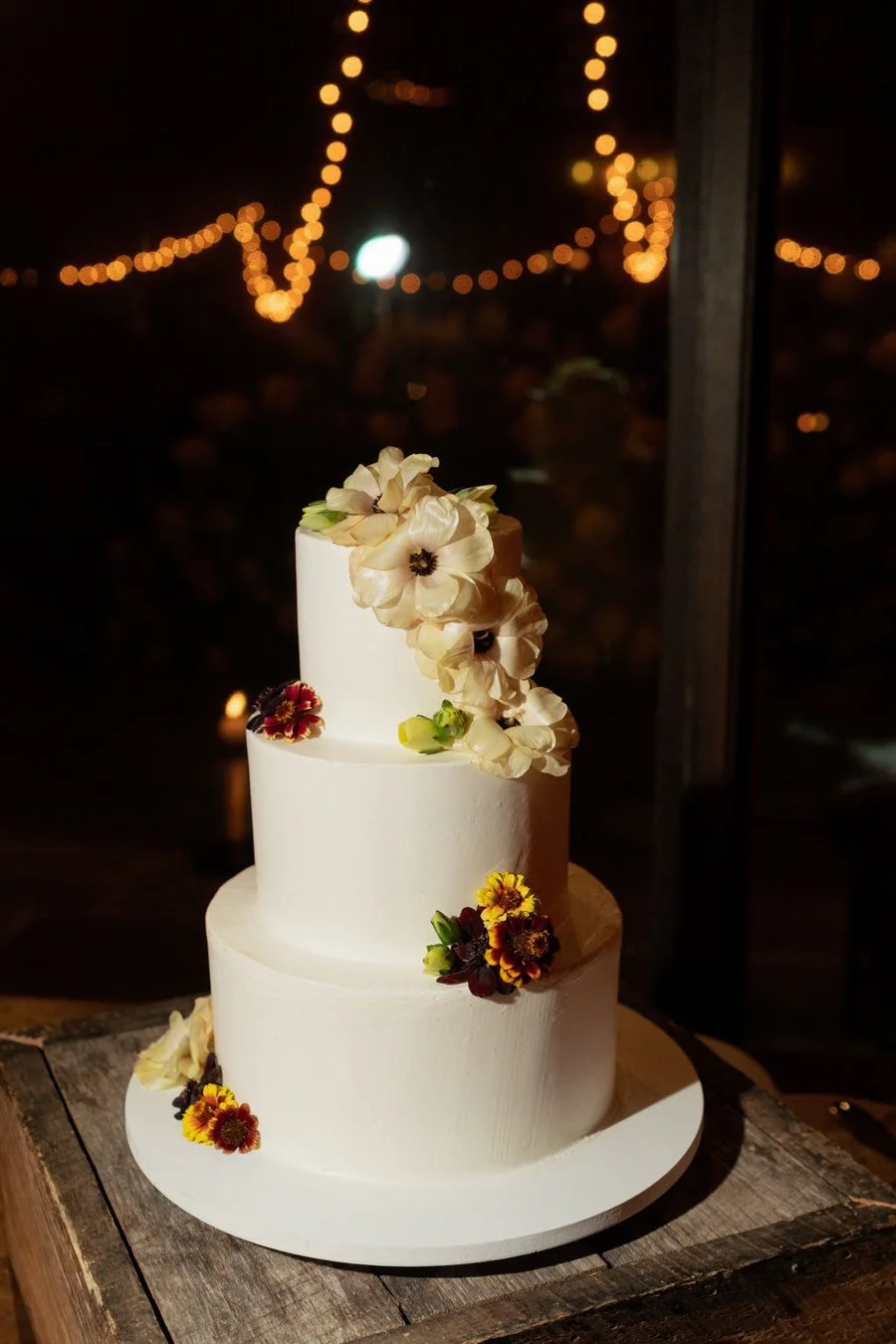 wedding-cake-buttercream-tiers-fresh-flowers.jpg