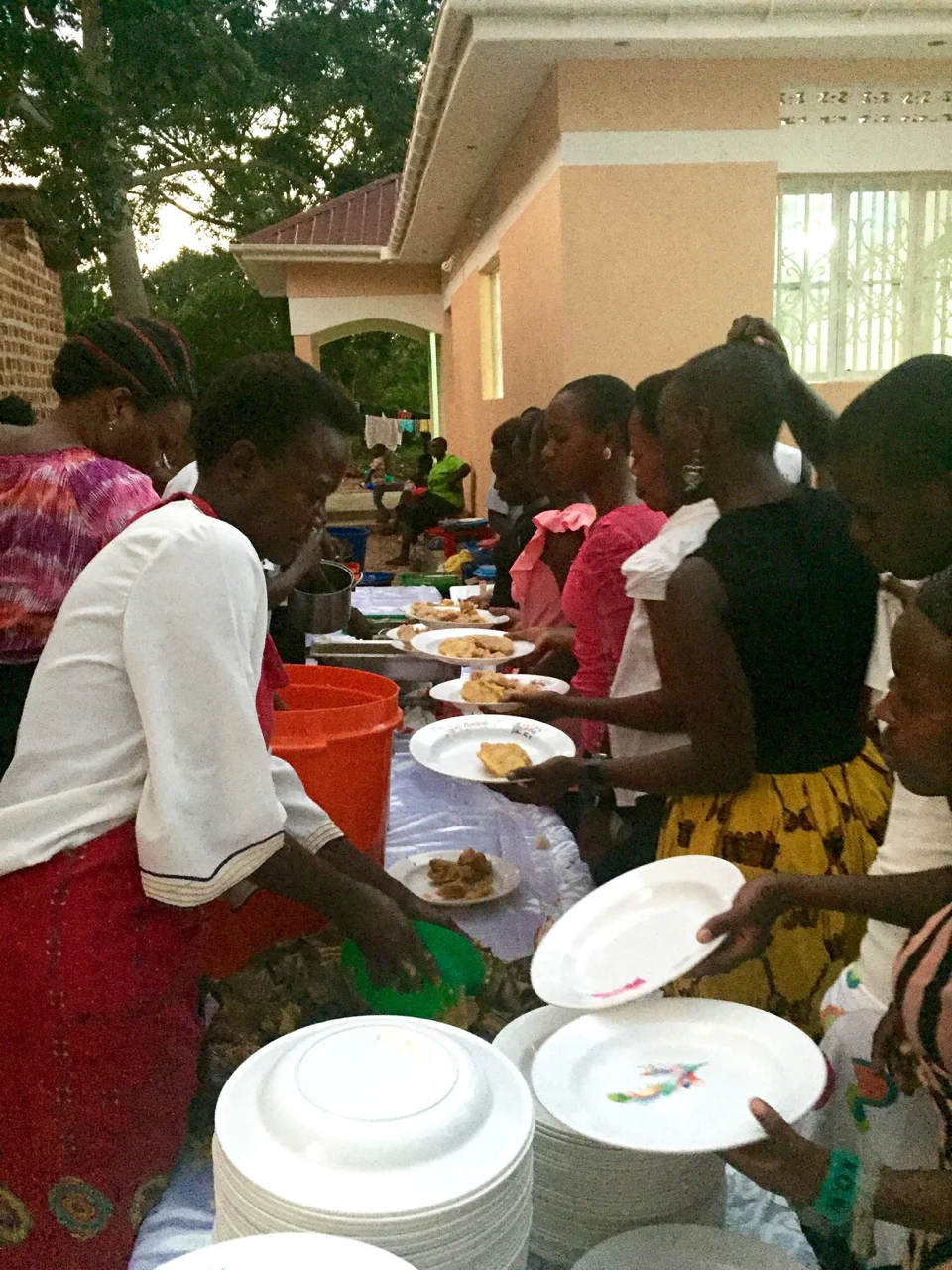 Bombo Pentacostal Church ladies serve the feast they prepared!