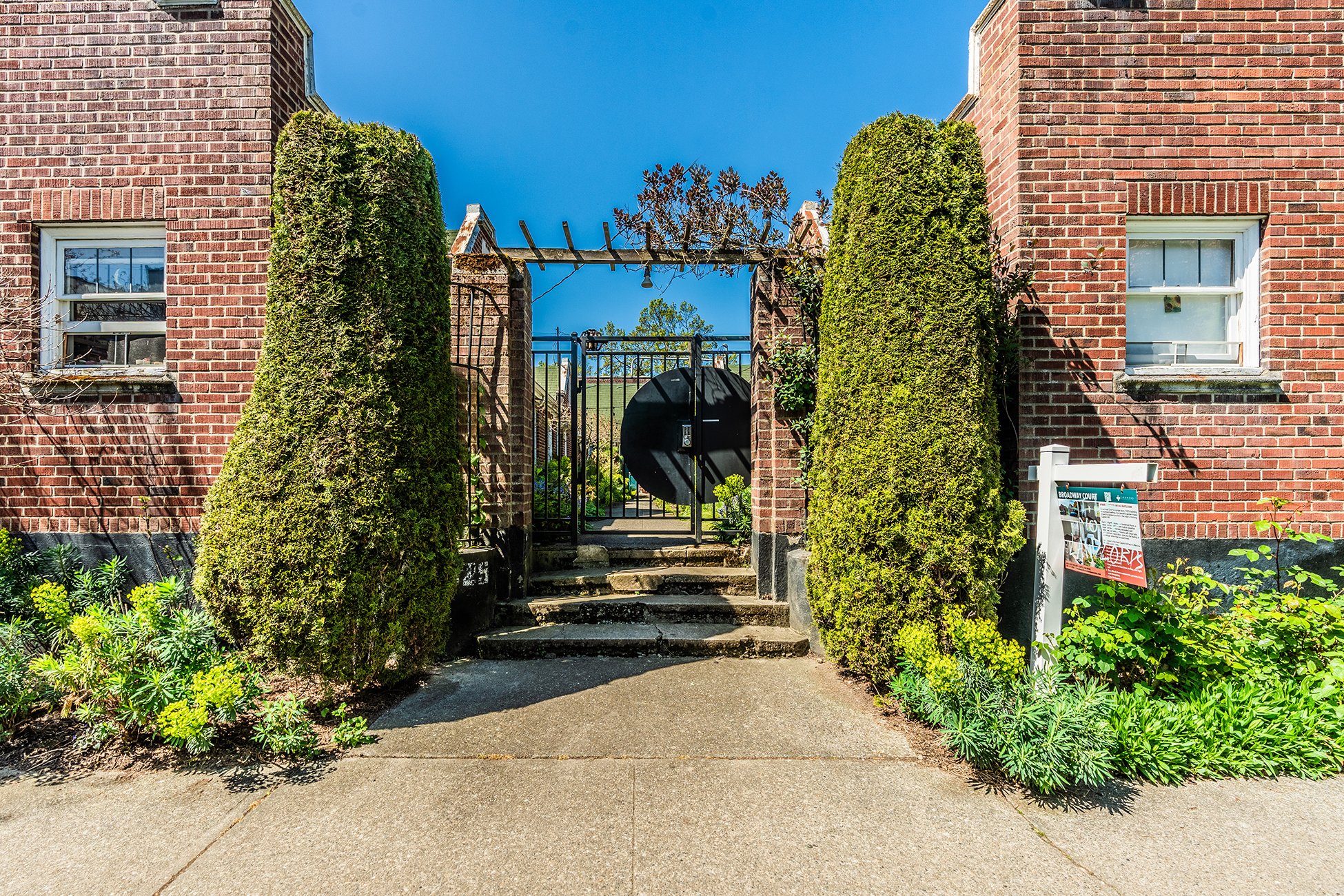 Broadway Court Apartments gate