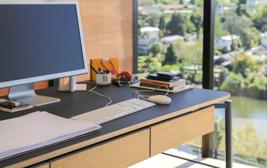 Matt Black Work Surfaces Add to Creative Agency’s Refined Look