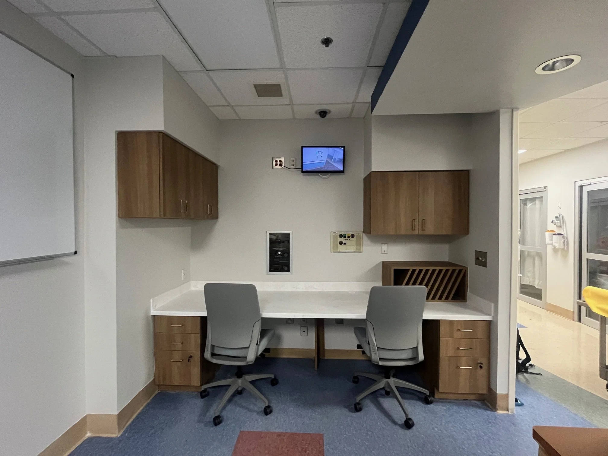 side wall of nurse station - new cabinets and countertops.jpeg