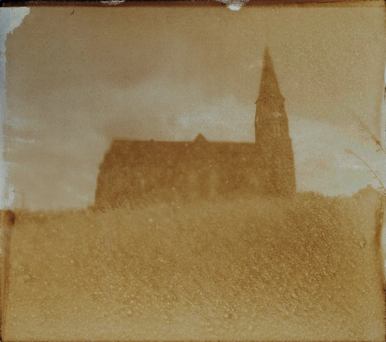 Open Area, 2025, bitumen hand print on Metal plate (Heliography), 15 × 21 cm.