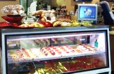 Breads and Pastries fill a case at La Quiche Parisienne Bistro In downtown Albuquerque