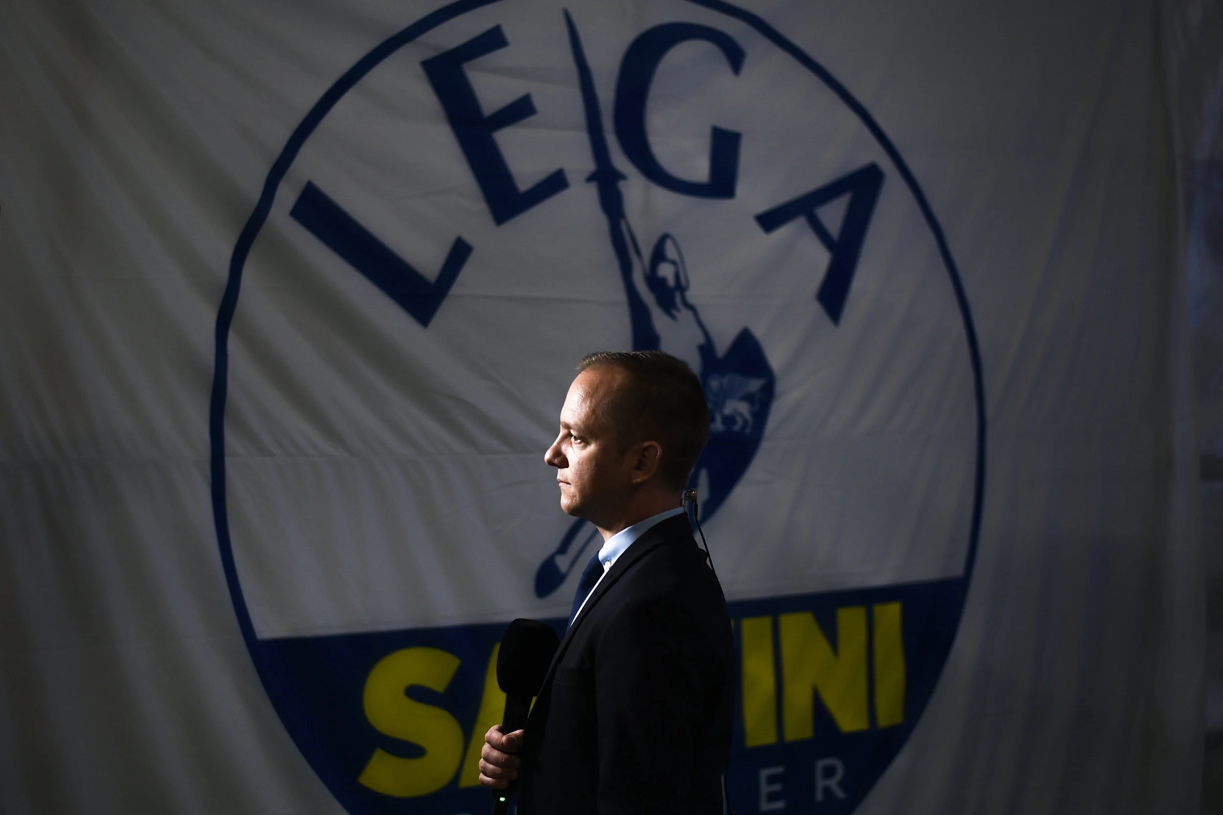 A journalist reports from the League party headquarters after the end of EU election voting, in Milan, Italy, May 26, 2019.